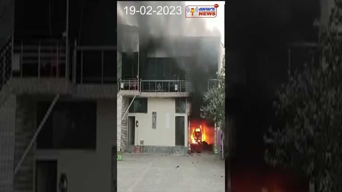 A mob torched some buildings after a violent clash broke out between two groups over a parking dispu